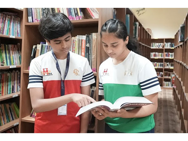 Students engaged in collaborative reading