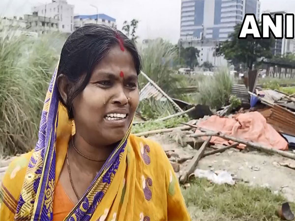 A local woman breaks down after demolition of Dhaka's only Durga temple. (Photo/ANI)