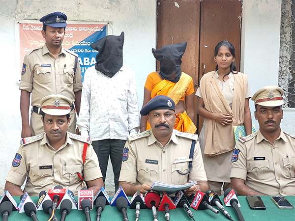  Adilabad Police with the accused. (Photo/ANI) 