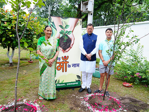 Uttarakhand CM Pushkar Singh Dhami plants sapling along with his mother and son (Photo/CMO)