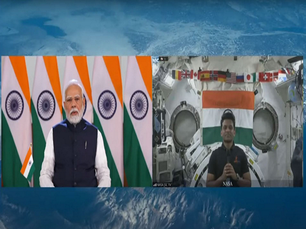 PM Modi interacts with Group Captain Shukla, first Indian at ISS. (Photo/NarendraModiYoutube)