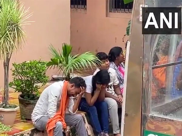 Distraught people outside post-mortem centre in Puri (Photo/ANI)