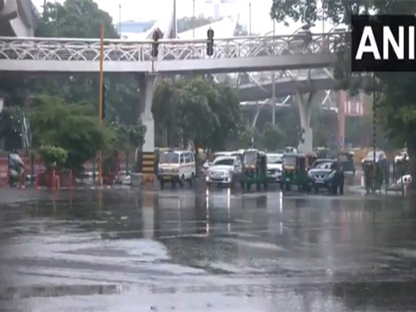 Light rain lashes several parts of the National Capital. (Photo/ANI)