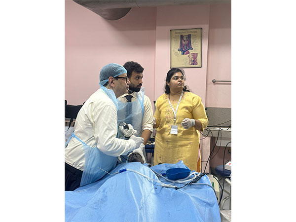 (L-R): Dr. Nitin M. Nagarkar, Pro Vice-Chancellor (MHS) and Dean (Medical), performing a cadaveric surgery during a hands-on practice session at the RHIMES Conference.