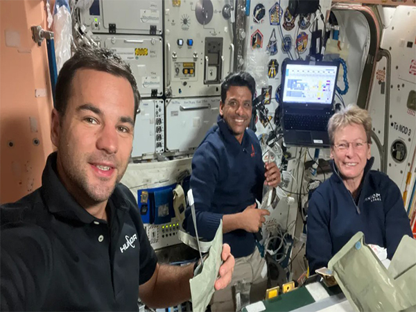 Ax-4 Mission Specialist Tibor Kapu takes a selfie with Commander Peggy Whitson and Pilot Shubhanshu Shukla while they enjoy a meal aboard the International Space Station. (Photo/Axiom Space)