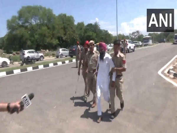 SAD supporter detained in Mohali (Photo/ANI)