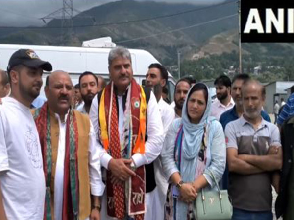 J&K Deputy CM Surinder Chaudhary welcomes first batch of Amarnath Yatra pilgrims in Banihal (Photo/ANI)
