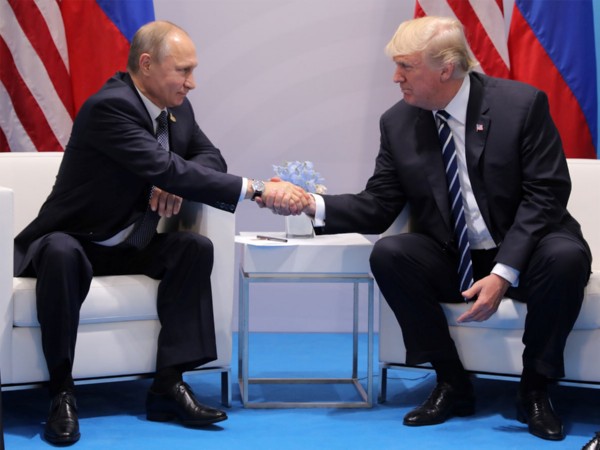 A 2017 file photo of Vladimir Putin with Donald Trump at the G20 summit in Hamburg. (File Photo/Reuters) A 2017 file photo of Vladimir Putin with Donald Trump at the G20 summit in Hamburg. (File Photo/Reuters)