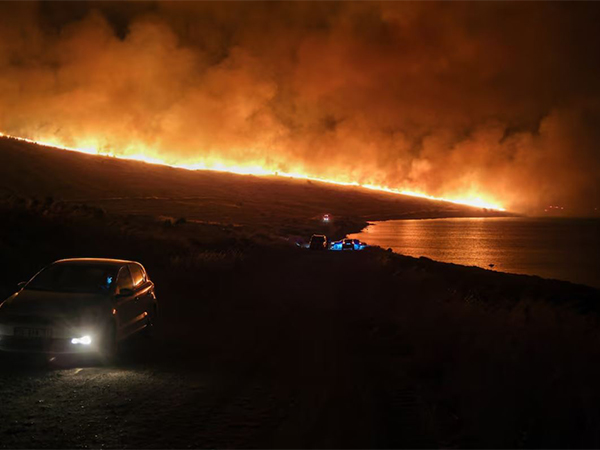 A wildfire burns near Alacati in Izmir province, Turkey (Image/Reuters)