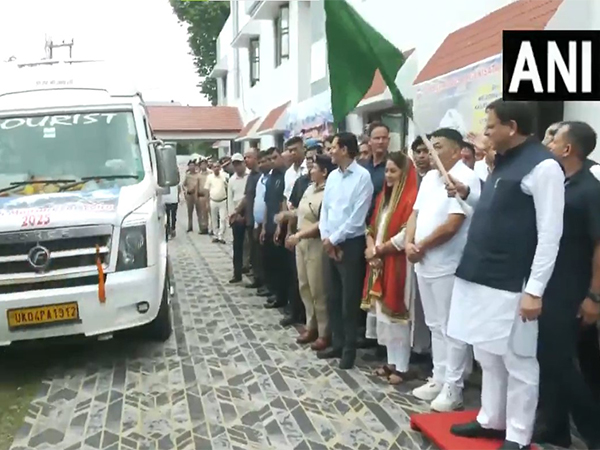 Dhami flagged off the first group of pilgrims for the Kailash Mansarovar Yatra from Tanakpur. (Photo/ANI)