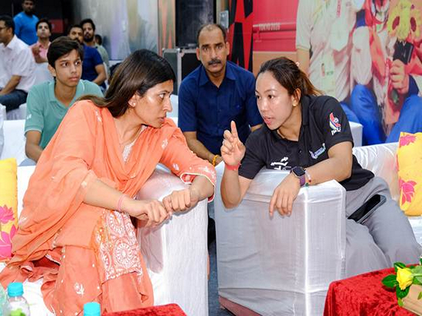 MoS Raksha Khadse with Mirabai Chanu and young athletes at the Weightlifting Warriors Academy in Modinagar (Photo/PIB)