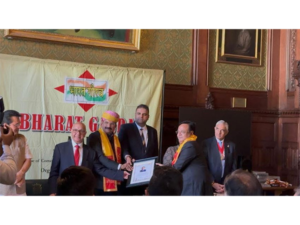 Pt. Suresh Mishra, President, Bharat Gaurav Award, confers the award to Mr. Pravin Chandan at British Parliament, with MP Virendra Sharma and ex-Mayor Sunil Chopra Pt. Suresh Mishra, President, Bharat Gaurav Award, confers the award to Mr. Pravin Chandan at British Parliament, with MP Virendra Sharma and ex-Mayor Sunil Chopra