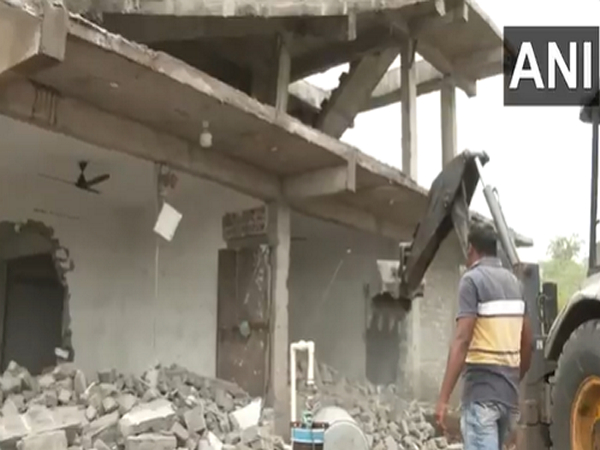 Illegal structure being demolished (Photo/ANI)