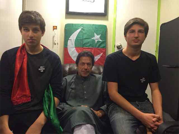 Imran Khan seated with his sons, Suleman and Kasim, amid renewed debate over their potential political role in Pakistan (Image: X/@qasim__khan)