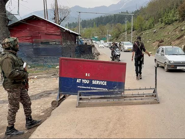 Police officers stop vehicles at a check point Anantnag district (File Image/Reuters)