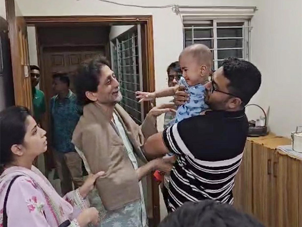 Abul Barkat bids farewell to family members after police arrest him (Photo courtesy: Arunu Barkat, daughter of Abul Barkat)