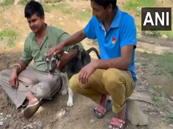 Pet dog Rocky with his family members (Photo/ANI)