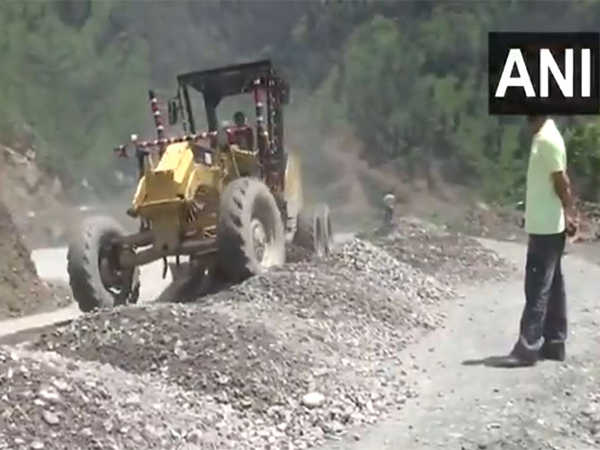 Construction work on Megha Budhal–Mahore–Gool Road in Rajouri. (Photo/ANI)