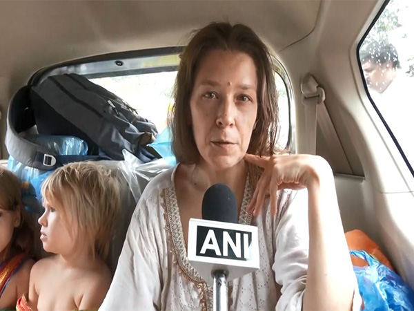 Russian woman Nina Kutina with her children after being rescued from a cave near Gokarna by police and processed by FRRO officials in Bengaluru (Photo/ANI) Russian woman Nina Kutina with her children after being rescued from a cave near Gokarna by police and processed by FRRO officials in Bengaluru (Photo/ANI)