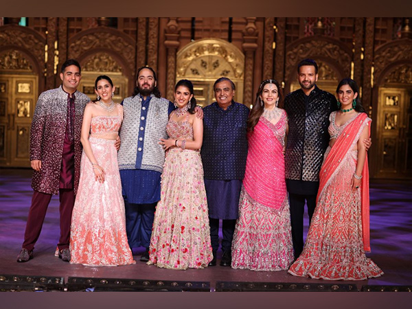  Family (L to R) Mr Akash Ambani, Mrs Shloka Ambani, Mr Anant Ambani, Mrs Radhika Ambani, Mr Mukesh Ambani, Mrs Nita Ambani, Mr Anand Piramal, Mrs Isha Ambani