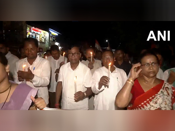 Congress leaders holds a candle light protest against the Balasore Self-immolation case. (Photo/ANI) Congress leaders holds a candle light protest against the Balasore Self-immolation case. (Photo/ANI)