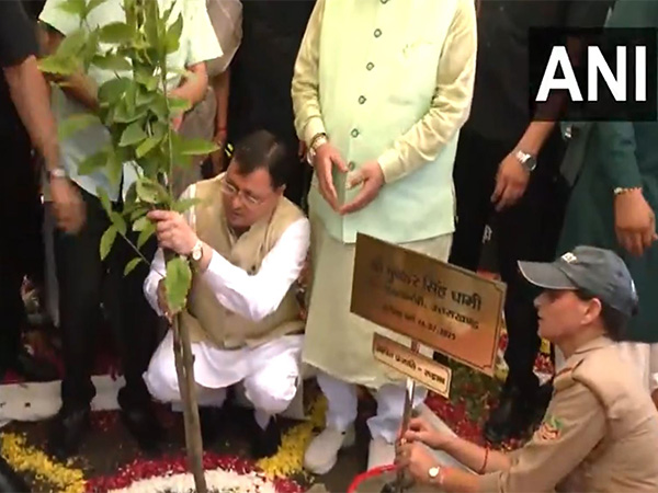 CM Dhami plants a tree on the occasion of Harela at Gorkha Military Inter College, Dehradun (Photo/ANI)