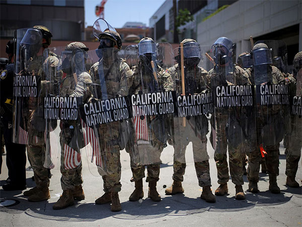 Members of the California National Guard carry shields during a protest (File Photo/Reuters) Members of the California National Guard carry shields during a protest (File Photo/Reuters)