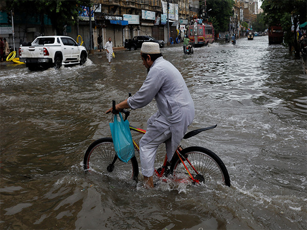 Residents navigate flooded steets as heavy monsoon rains lash Punjab, Pakistan (File Photo/Reuters) Residents navigate flooded steets as heavy monsoon rains lash Punjab, Pakistan (File Photo/Reuters)