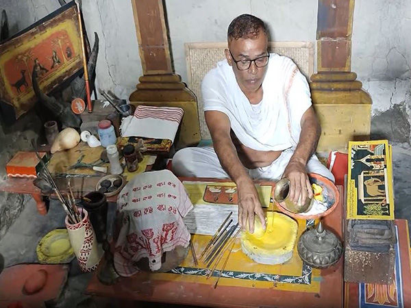 Mridul Barua doing manuscript painting in Assam’s Majuli (Photo/ANI)