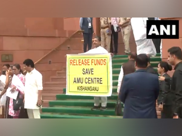 Congress MP Md Jawaid alleges that the PM Modi government is ignoring Bihar while holding a banner outside Parliament. (PhotoANI)
