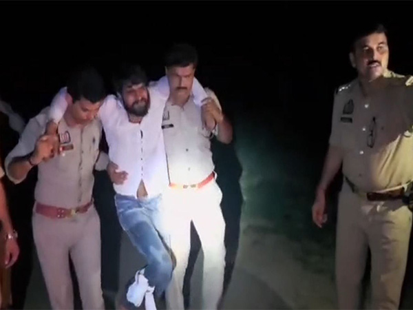 Mathura Police team with arrested accused (Photo/ANI)