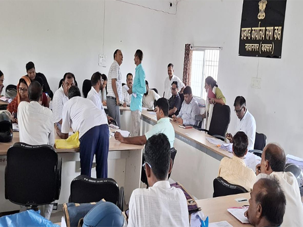 Voters filling the enumeration form (Photo/ANI)