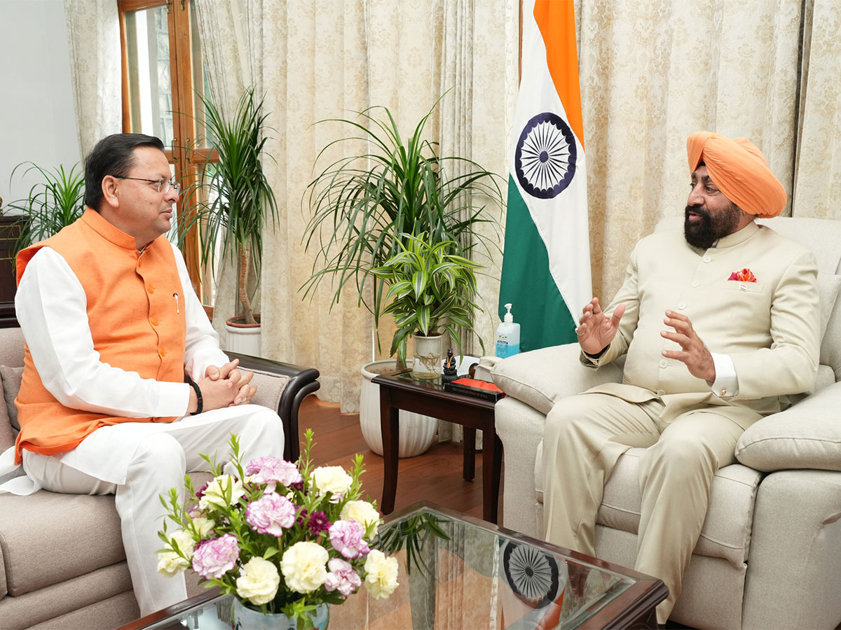 Uttarakhand Chief Minister Pushkar Singh Dhami with Governor Lieutenant General Gurmeet Singh (retd)(Photo/ANI)