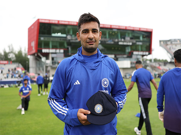 Anshul Kamboj with his Test cap. (Photo: @BCCI X) Anshul Kamboj with his Test cap. (Photo: @BCCI X)