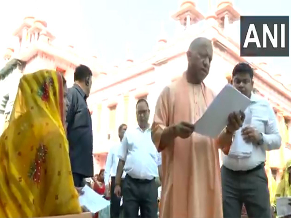 UP CM Yogi listens to public grievances in Gorakhpur (Photo/ANI)