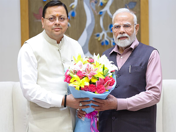 Uttarakhand CM Pushkar Singh Dhami and PM Narendra Modi (File Photo/ANI) 