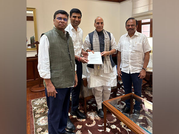 TDP MPs with Defence Minister Rajnath Singh (Photo/ANI)