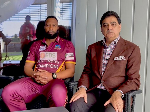 Former West Indies captain Kieron Pollard with West Indies Champions owner Ajay Sethi (Photo: ANI)