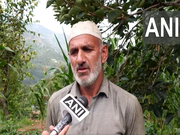 Mohammad Aslam Bhat, a retired Indian Army soldier who turned to farming. (Photo/ANI)