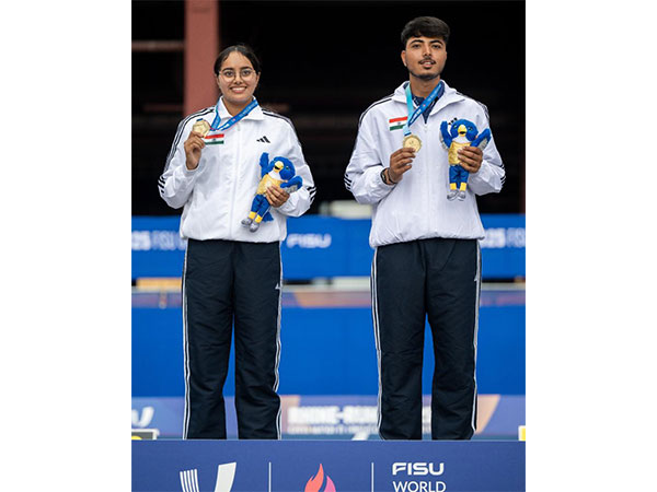 India's compound mixed team archery of Parneet Kaur (L) and Kushal Dalal (R) with gold medal (Photo: X/@Media_SAI)