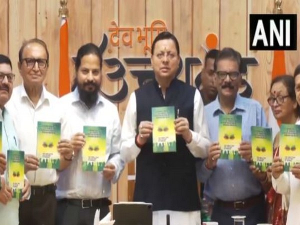 Uttarakhand Chief Minister Pushkar Singh Dhami launches a book 'Continuous Welfare of Students'  (Photo/ANI)  