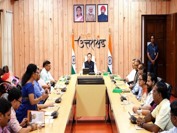 Uttarakhand CM launches a book 'Continuous Welfare of Students' in Dehradun. (Photo/ANI)