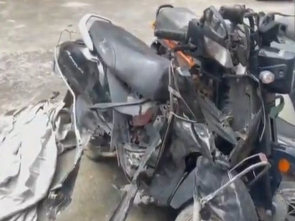The mangled two-wheeler involved in the accident in Noida on July 26 (Photo/ANI)