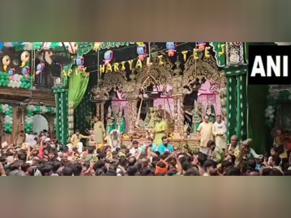 Devotees throng Vrindavan’s Banke Bihari Mandir on occasion of Hariyali Teej (Photo/ANI) 