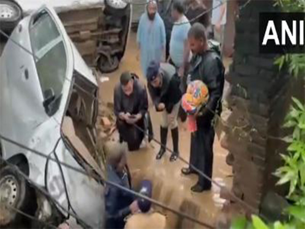Rescue teams conduct search operations in flood-hit Mandi, Himachal Pradesh (Photo/ANI)
