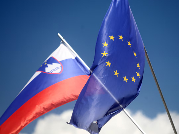 European Union and Slovenian flags seen fluttering in Medvode, Slovenia, ahead of Slovenia’s EU presidency on June 30, 2021 (File Photo/Reuters)