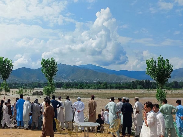 Residents watch flooded river in Pakistan (File Image/ Reuters)