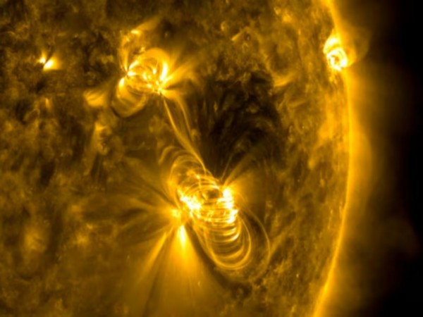Medium-sized (M2) solar flare and a coronal mass ejection  (Photo/ Reuters)