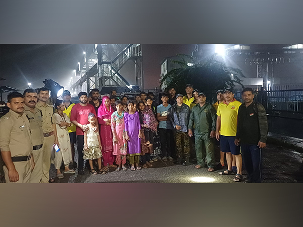 Uttarakhand State Disaster Response Force (SDRF) with rescued people (Photo/ANI)