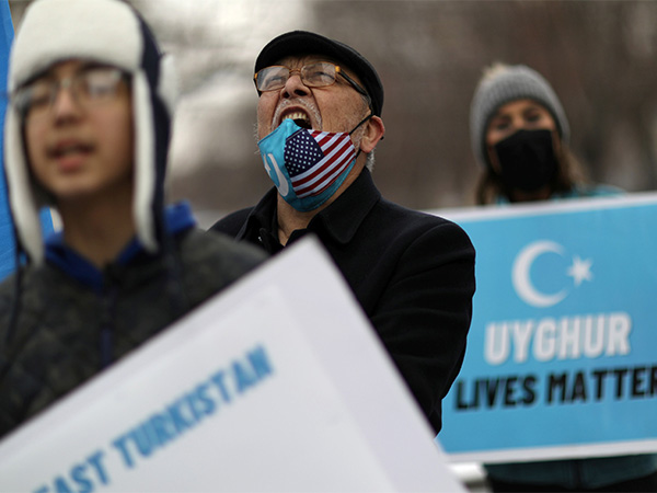 A protest against Uyghur exploitation (File Photo/Reuters)